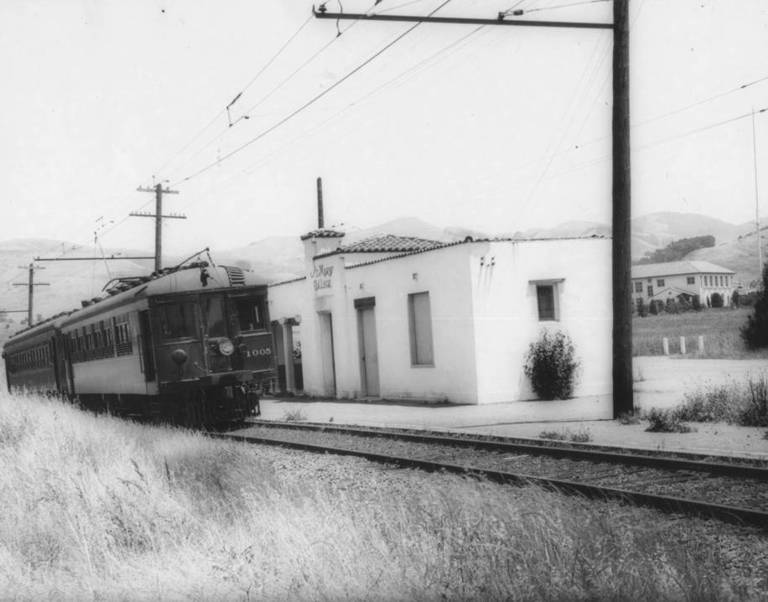 00_77
St Marys College 6-8-41. One of the last passenger trains shown here. Local making the following stops: Sequoia, Canyon, Pinehurst, Valle Vista, Moraga, SMC, Burton, Glenside, West Lafayette, Lafayette. Photo from Joe McTique collection00-77
