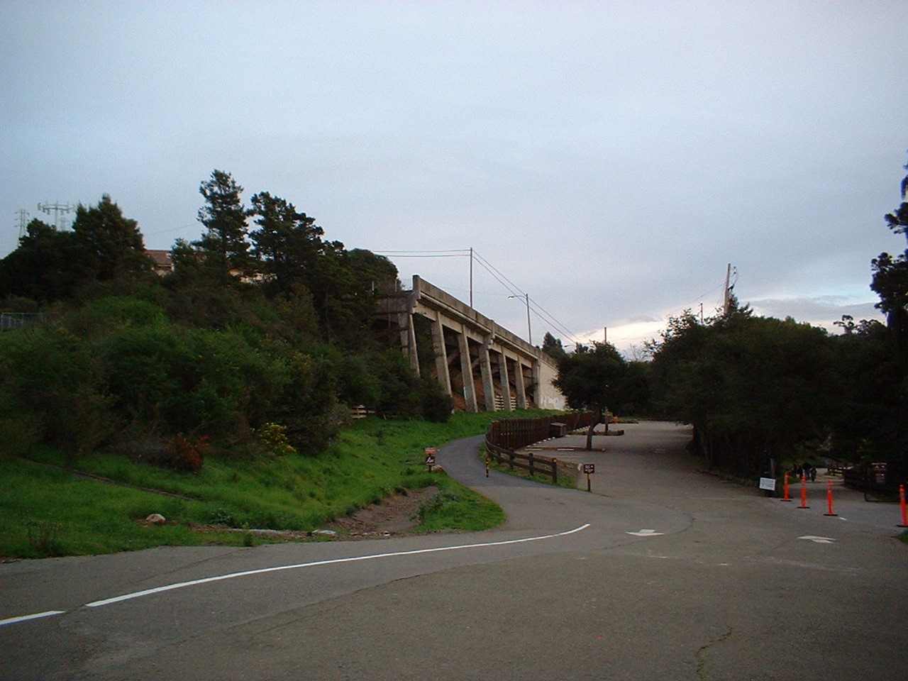 2004_0229_171842AA
This is a view of the r.o.w. at Temescal, looking East towards Montclairl. This photo can be compared to that of the one in the newspaper article, also posted on this site. Notice that little has changed.
