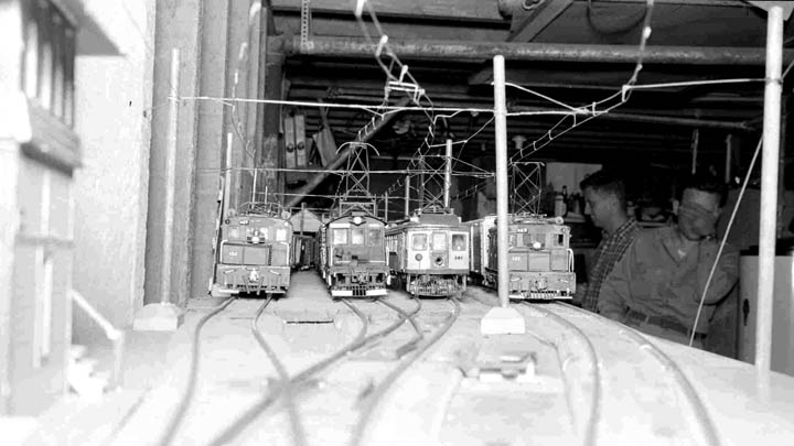 SNRRhellerslayout
Roger Heller's Sacramento Northern model railroad in the basement of his home in Oakland in 1946. He was assisted by Les Krames and as I recall these were all scratch built. The motors are L to R: 102, -?-, 501 and 101. <i>Courtesy of W.T. Larkins</i>
