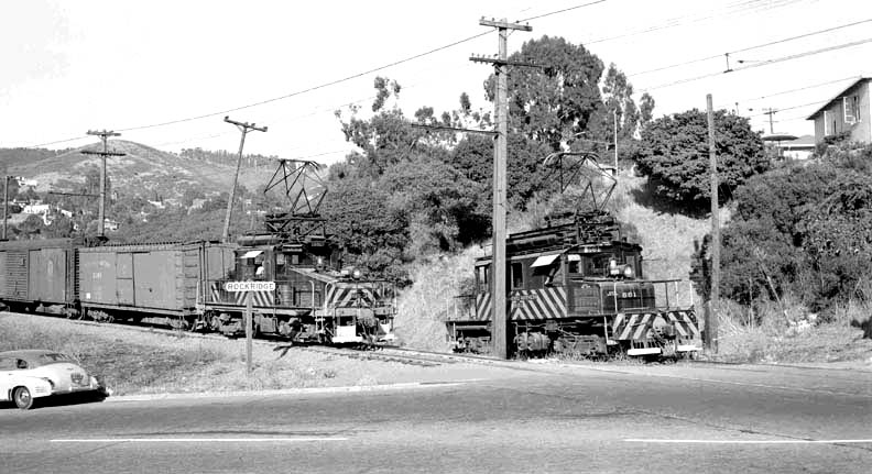 SNRRtrainRocksign
SN 653 pulling cars at the Rockridge crossing. The sign is to the left of the train. 661 is waiting on a spur track. 1946-47 <i>Courtesy of W.T. Larkins</i>
