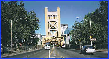 Sacramento_Tower_Bridge_1999
This is the West end of the Tower Bridge, as it appears today. The tracks, which originally crossed in the center of the bridge, now terminate slightly to the right of the bridge approach. Traffic now approaches the bridge straight on, as opposed to at
